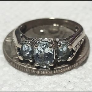 10k white gold ring with blue topaz